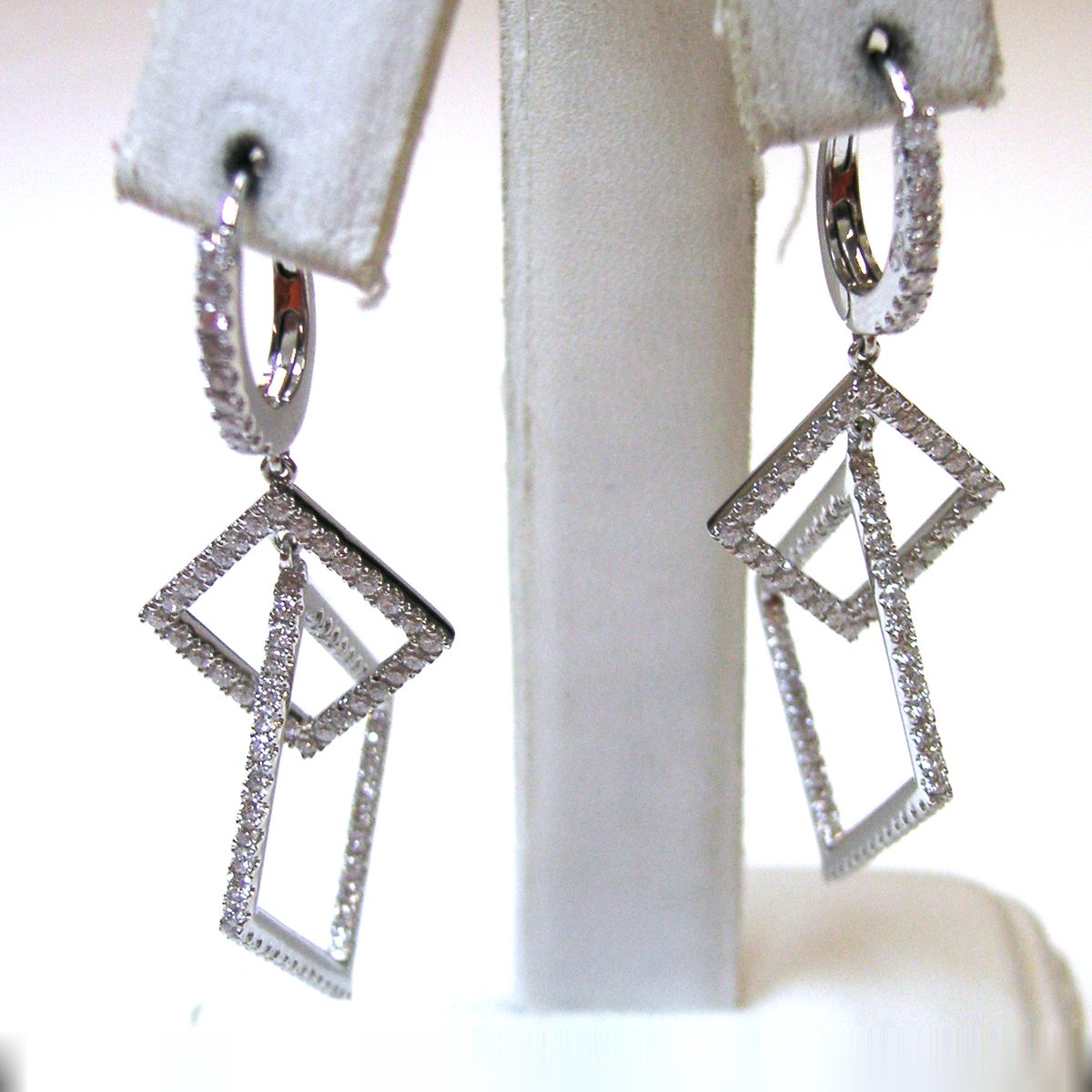 White gold dangle earrings with overlapping pave diamond rectangles